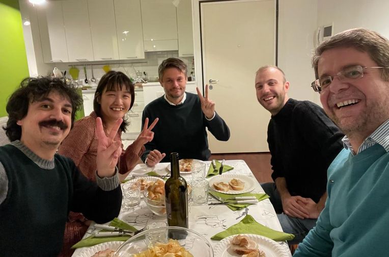 Fabio, Naoko, and colleagues at table